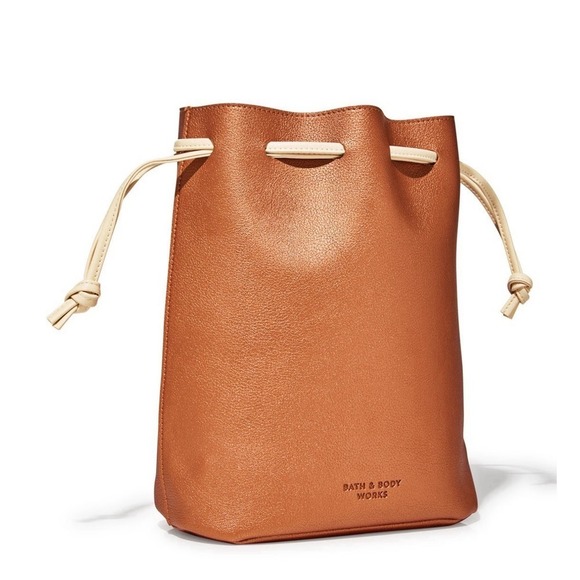 Bath & Body Works Handbags - Bath Body Bath metallic penny copper color with Tan Drawstring Bag